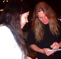 John Young with Sharan at the John Wetton Fan Convention, July 2002